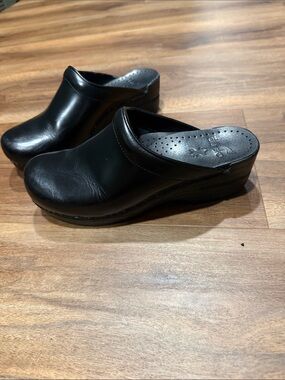 Dansko Black Leather Slip-On Women's Clogs